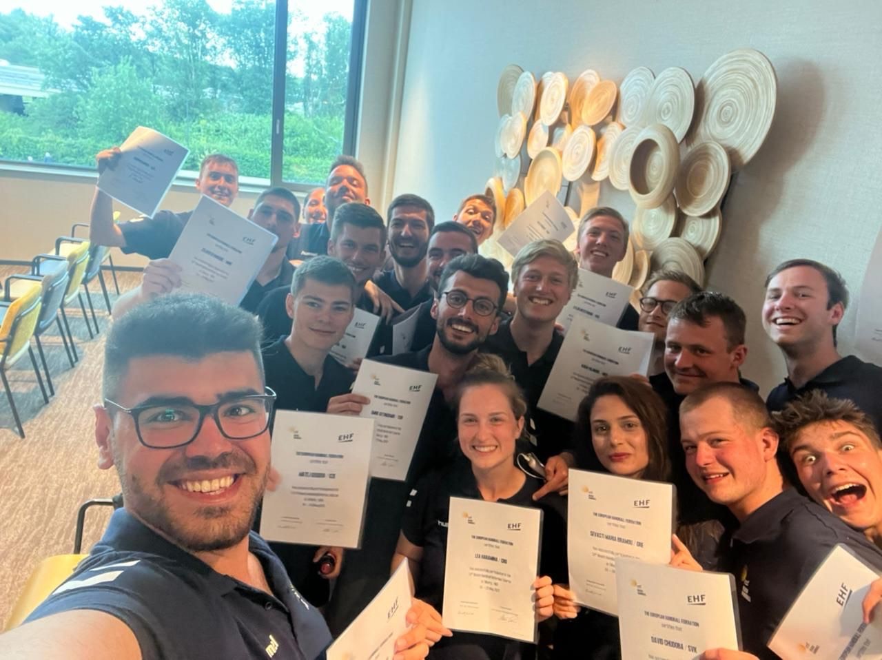 Officials and coaches complete beach handball courses